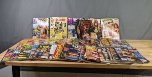 lot 384 image: Collection of World Wrestling Entertainment and Wrestling Smackdown Mania Magazines and Catalogs WWE X