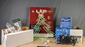 lot 386 image: Assortment of Christmas Decoration String Lights , L.E.D Window Lights and Village House Buildings X
