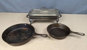 lot 395 image: Vintage Pyrex Clear Glass Casserole Dish w Silver Base and Lid & Set of Lodge Cast Iron Pans X