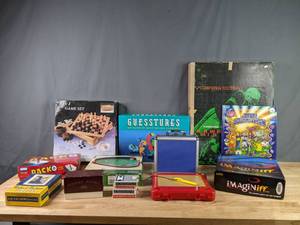 lot 436 image: Collection of Games Baseball Desk Game Computer Football Game Etch A Sketch Playing Cards Golden Trivia  X