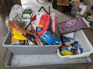 lot 510 image: Miscellaneous Assortment of Halloween 25 Black Light IndoorOutdoor Lights, Toy Cars, Toy Army Men, Basketball Hoop, BaseballSoftballs, Soccer Ball and More X