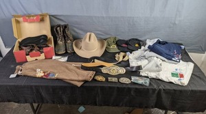 lot 483 image: T-Shirts Size Lg and XL, Boots and Sandals Mens Size 9, Large Belt Buckels, Hats, Size 16 Shorts   X