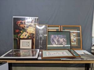lot 496 image: Assortment of Framed Art Vintage Golf Balls, A Friend in Need by C.M. Collidge, Anatomic Chart of Adult Human Skeleton, SnowmanSanta Art, Minneapolis Minnesota Series 2 and More X
