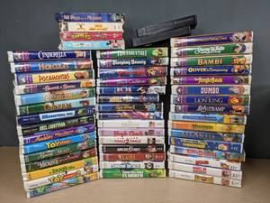 lot 570 image: 52-Piece VHS Collection, Mostly Disney Bambi, Dumbo, Lilo & Stitch, Toy Story, and More  Z