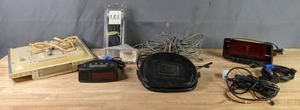 lot 579 image: Mixed Lot GE Slim Spacemaker CDClockRadio, LEI Transducer, (2) Alarm Clocks, Camera  X