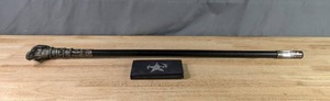lot 582 image: Set of (3) Marlboro Steel Darts and a Skull-Topped Sword Cane  X