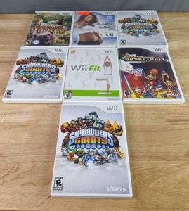 lot 552 image: Wii Game Bundle Wii Fit, Jillian Michaels Fitness Ultimatum 2010, Skylanders Giants and More Z
