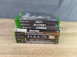 lot 526 image: Set of 8 Xbox One & Microsoft Xbox Games Fallout 4, Battlefield 1, Sneak King, Greg Hastings Tournament Paintball, Cabelas Deer Hunt 2004 Season and More Z