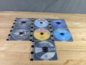 lot 525 image: Collection of 7 Wii Games The Beatles Rockband, The Smurfs Dance Party, Glee Karaoke Revolution, Celebrity Sports Showdown, Tiger Woods PGA Tour 09 All-Play and More Z