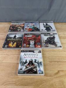 lot 546 image: Collection of (7) PS3 Playstation 3 Video Games - Call of Duty Advanced Warfare and MW3, NBA 2k14, Disney Infinity, Assassins Creed Brotherhood, and more Z