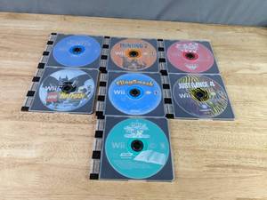 lot 548 image: Collection of (7) Wii Video Games - LEGO Batman, Just Dance 4, Are You Smarter Than an 5th Grader, and more Z