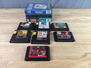 lot 523 image: Pile of SEGA Genesis Games Tommy Lasorda Baseball, Tony LaRussa Baseball, EA Sports Bulls Vs. Blazers & The NBA Playoffs, Madden NFL 95, Lakers VS. Celtics & The NBA Playoffs and More Z