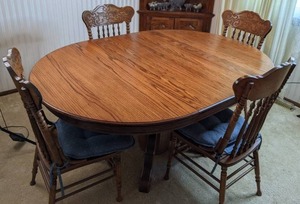 lot 78 image: 5-Piece Pedestal Extending Oval Dining Table Set with Armless Padded Chairs