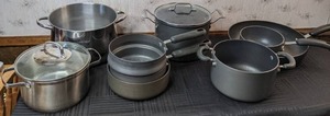 lot 61 image: Large Collection of Pots and Pans by Emeril Lagasse, Circulon, and More