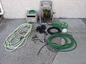 lot 126 image: An Assortment of Hoses, Reels, and Accessories