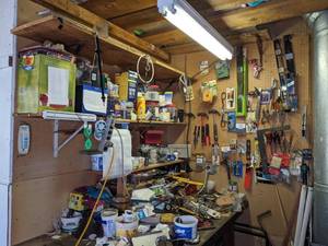 lot 180 image: Large Collection of Tools, Lighting, Pegboard, and Miscellaneous Garage Items (Hammers, Screwdrivers, Outlets, Light Bulbs, Levels, and more)