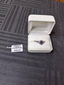 lot 207 image: Macys Faceted Stones Sterling Silver SS Oval Tanzanite & Diamond Ring