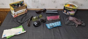 lot 94 image: Glasses and Sunglasses Foster Grant Reading Glasses, Polarizing Sunglasses, Cases, Cleaning Cloths and More
