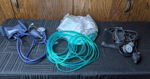 lot 215 image: Blood Pressure Cuff, Nasal Canula, Oxygen Tubing, Blood Pressure Cuff with Stethoscope Attached