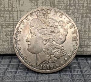 lot 13 image: Antique 1879 Liberty Dollar Coin