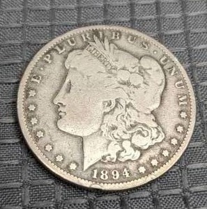 lot 16 image: Antique 1894 Liberty Dollar Coin
