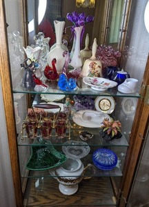 lot 376 image: Assortment of Vintage Display Case Items Glass Figurines, Hummel bell, Decorative Plates, Vases, Cordial Set, Tea Pot and More