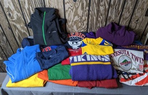 lot 379 image: Assortment of Womens Clothes and Fan Gear MN Twins, MLB, NFL, Vikings, Golphers, New Adidas Jersey, Columbia Fleece Coat and More
