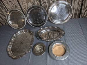 lot 401 image: Collection of (7) Vintage Decorative Silver Bowls and Plates Wilton Pewter Bowl A Dinner Without Wine is Like a Day without Sunshine, Avon The First Buffalo Nickel 1913 Bowl, Leonard Silver Plate, Oneida Silver Plate and More