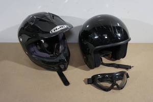 lot 101 image: Black Motorcycle Helmets and Goggles