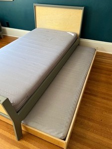 lot 98 image: oeuf Sparrow Twin Trundle Bed and Matching Nightstand