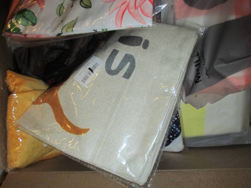 box of decorative pillow covers ...