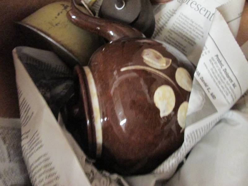 vintage oil cans and bean pot and m...