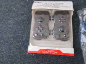 lot 30 image: Nintendo Switch Dualies Controllers...