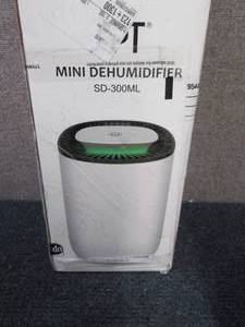 lot 297 image: SPT Mini Dehumidifier open box, pow...