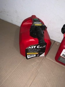 lot 12 image: Various Sizes and Branded Gasoline Press and Pour Cans. See Pictures