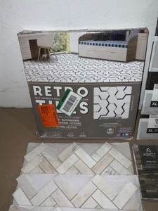lot 21 image: Various Types and Quantities of Wall Peel and Stick Tiles and Wall Tiles. See Pictures