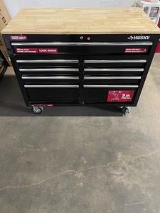 lot 90 image: Husky 46 in. W x 24.5 in. D Standard Duty 9-Drawer Mobile Workbench Tool Chest with Solid Wood Top in Gloss Black See Pictures