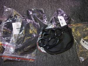 lot 92 image: 9 steelbrass knuckles ...