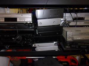 lot 200 image: shelf full of a combination of dvd ...