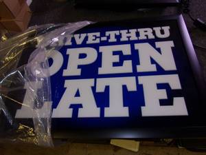 lot 212 image: lbdrive thru open late sign teste...