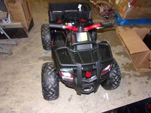 lot 234 image: huffy 4 wheeler powers on missing s...