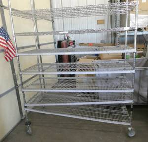 Assembled Nexel brand wire shelving cart on wheels 24x58x77 tall with 7 shelves