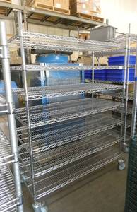 Assembled Uline brand wire shelving cart on wheels 24x48x70 tall with 7 shelves