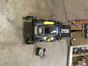 40V Brushless 20 in. Cordless Walk Behind Self-Propelled Lawn Mower with 6.0 Ah Battery & Charger by RYOBI Customer ReturnsSee Terms on Auction