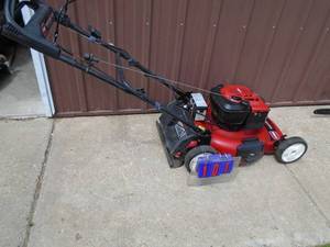 lot 101 image: Toro personal pace mower. Looks lightly used. Tested & works. As shown.