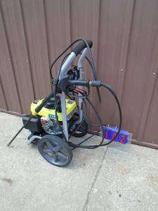 lot 102 image: Ryobi 2800 psi pressure washer. Looks nearly new. Tested & works. As shown.