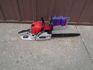 lot 104 image: Professional Tools model 9800 chainsaw. Lightly used. Good runner. As shown.