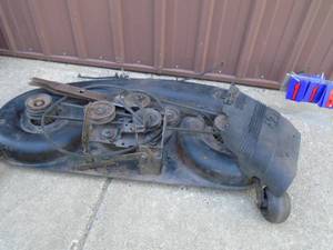 lot 119 image: Craftsman 42 mower deck with blades & extra blades. Good used condition. Tested & works. As shown.