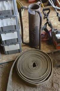 lot 119 image: Fire hose and post pounder