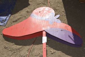 lot 143 image: Oversized red hat sign